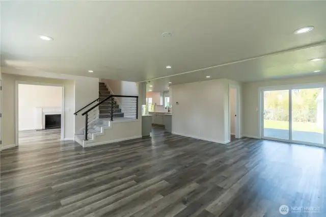 Living room and dining room. Sliding door to back yard.