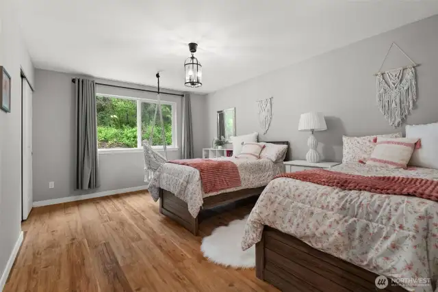 Beautiful light fixtures adorn each room, adding a charming shabby chic touch throughout the home.