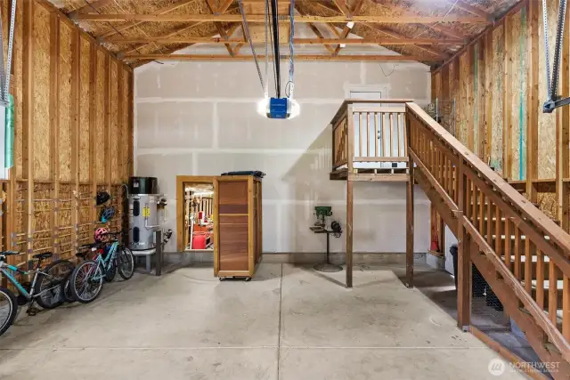A tall covered garage is perfect for oversized vehicles.  The homeowners have also installed an RV dump and hook up to the septic for easy maintenance.