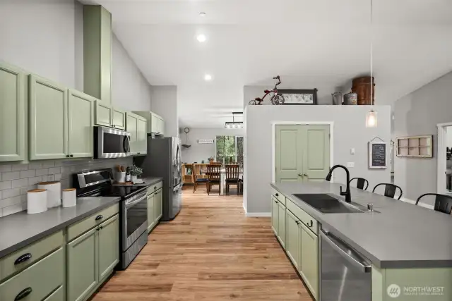 The oversized kitchen makes holiday gatherings a breeze, while the adjoining formal dining area provides the perfect setting to host memorable meals with loved ones.