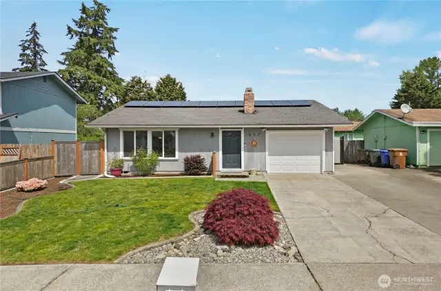 The attention to detail in this home is amazing; even curb strips for easy mowing in the front lawn. Alongside the garage there is additional parking space which can accommodate extra cars, or your small trailer or boat. It's securely gated to allow easy access of toys or vehicles.