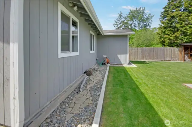 The terrific level and manicured yard is all ready for you to play or just relax in!