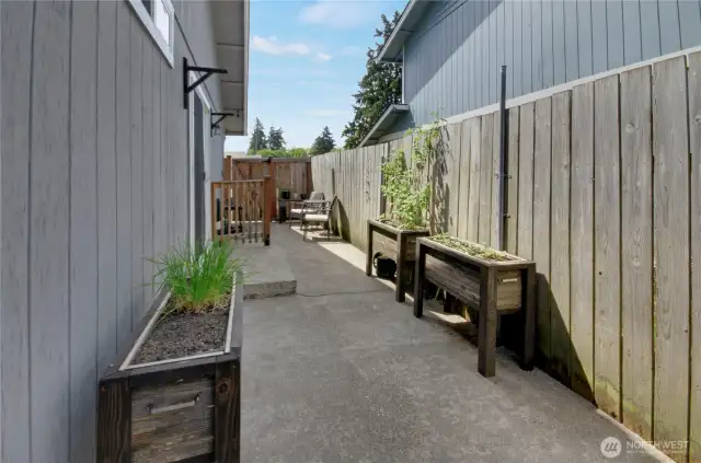 The seating area toward the top of the photo is just a few steps outside the sliding doors from the kitchen, dining room area. A great place for your morning coffee or tea, or perhaps a nightcap.