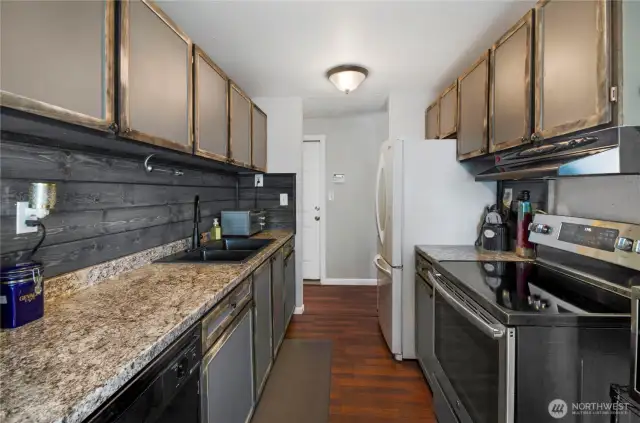 The kitchen is easy to work in and features abundant counter space and storage.