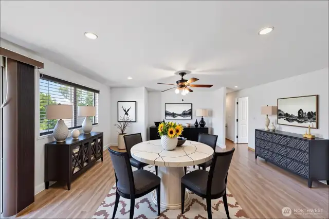 Virtually staged family room w/ eating space off kitchen