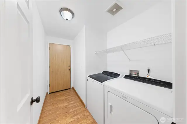 Laundry room leading to the fully insulated garage