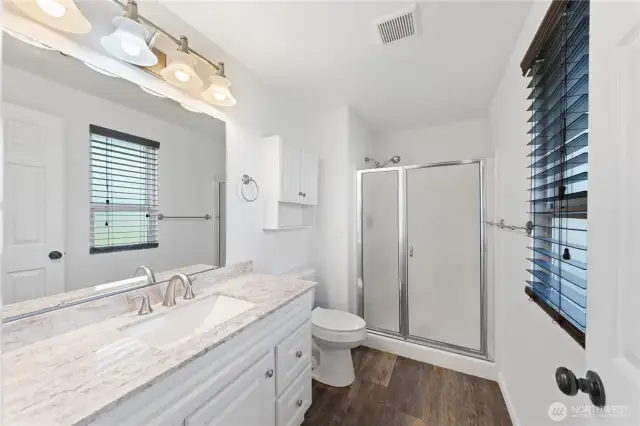 Attached primary 3/4 bath, nicely updated
