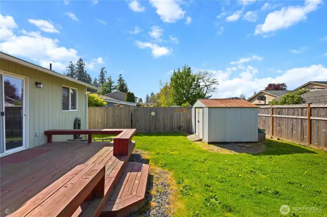 Outbuilding included.  Deck has been nicely painted since photo was taken