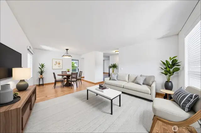 Virtually staged living room/formal dining room combo