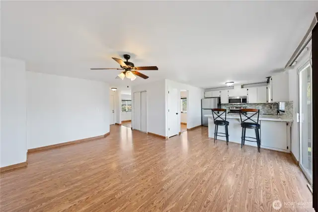 Another view of the family room looking towards the kitchen & front entry on Left