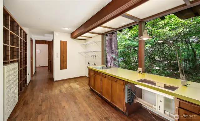 The hallway on the upper level connecting the bedroom wings.