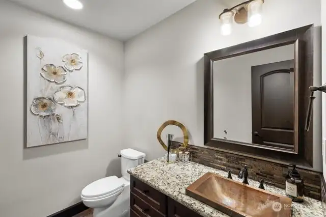 Powder room in daylight basement.