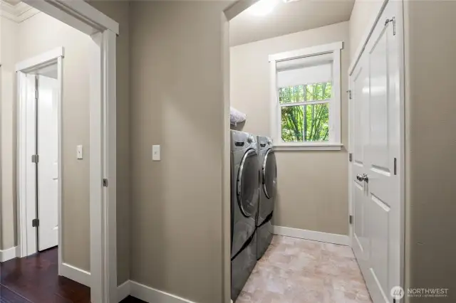 Main level laundry between kitchen and garage