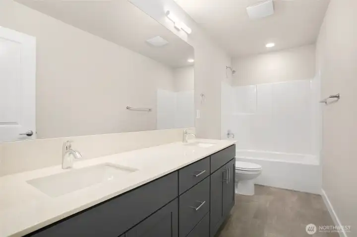 Secondary Bath has 2 sinks and plenty of counter space!