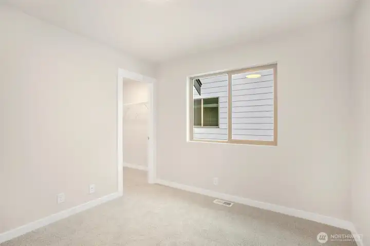 Secondary Bedroom #2 with a Walk-In Closet!