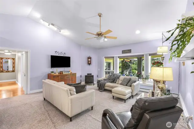 Natural gas fireplace, bay window, vaulted ceilings.