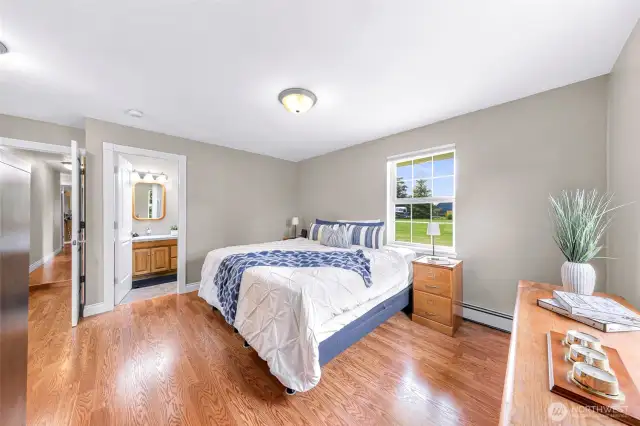 Large room which includes an en suite bathroom, big sitting area/work area.