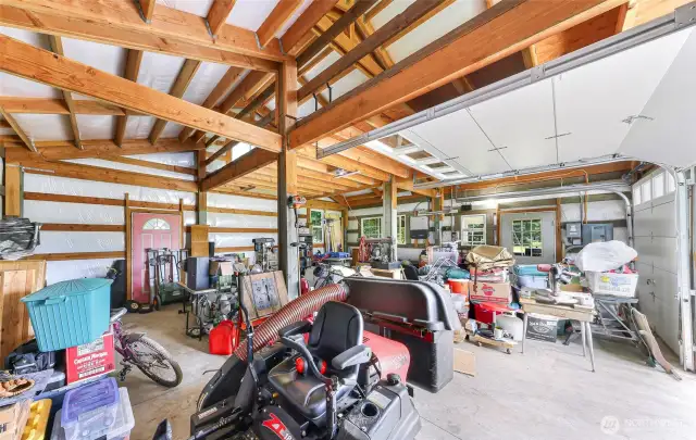 Shop is insulated, and has a loft for extra storage or hobby area. Covered and paved carport on the side.