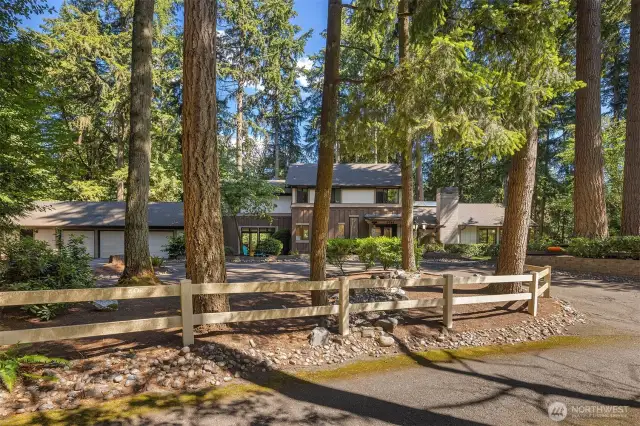 Woodland approach. Equestrian and walking trails abound.