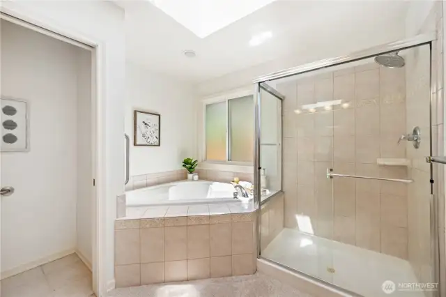 Primary en suite bathroom with a soaking tub, offering comfort and relaxation in your own private space.