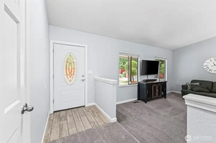 Front entry open to formal living room
