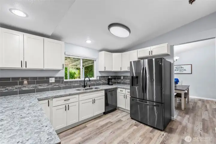 All kitchen appliances, including huge side by side refrigerator included
