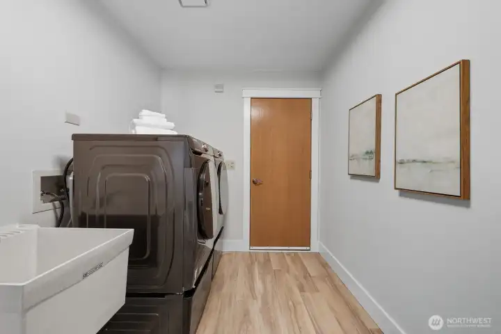 Laundry/mud room by garage entrance