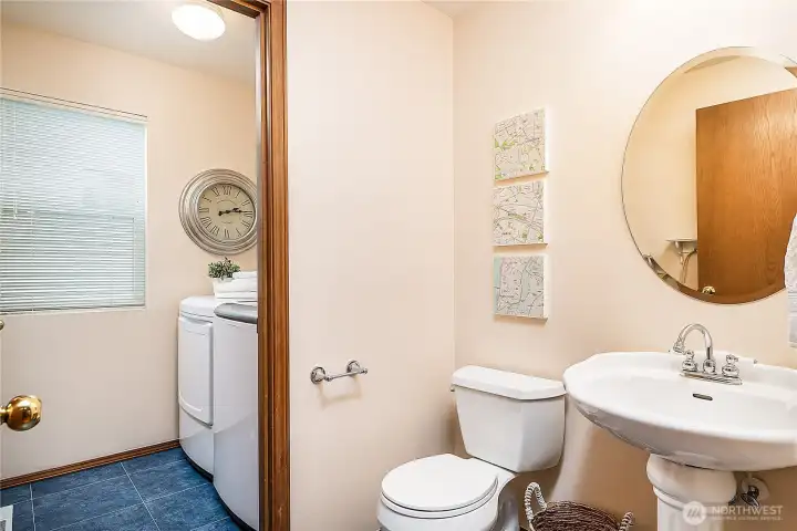 The Powder Room connects to Laundry Room which can be closed off with a door.