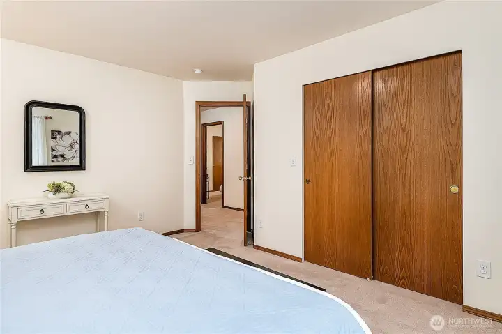 Primary Bedroom facing hallway. Large  Walk-In Closet on the right.