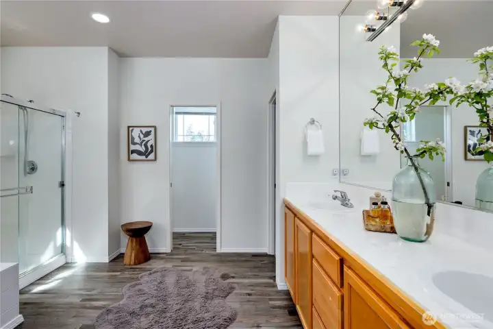 The 5-piece ensuite bath has new floors and a walk-in closet.