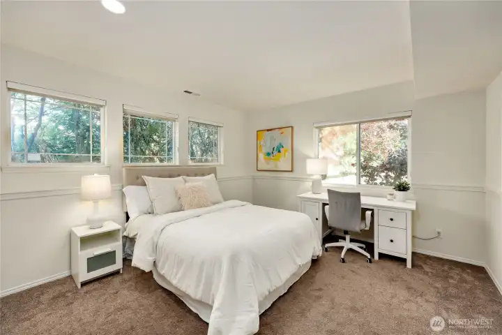 The second bedroom looks out over the front of the home.
