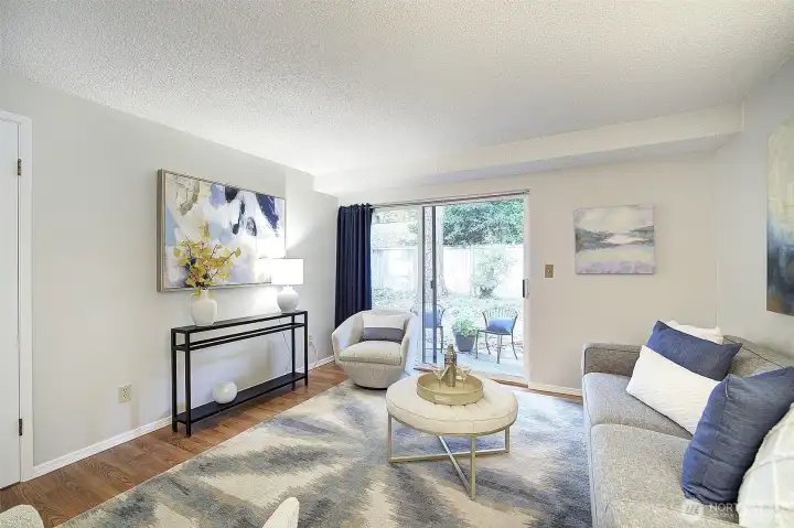 From this angle, you can see through the sliders out onto the patio and the lush back yard.  Imagine relaxing with a cup of coffee, checking your emails in the morning, or with a cool drink and enjoying the company of friends in the evening.