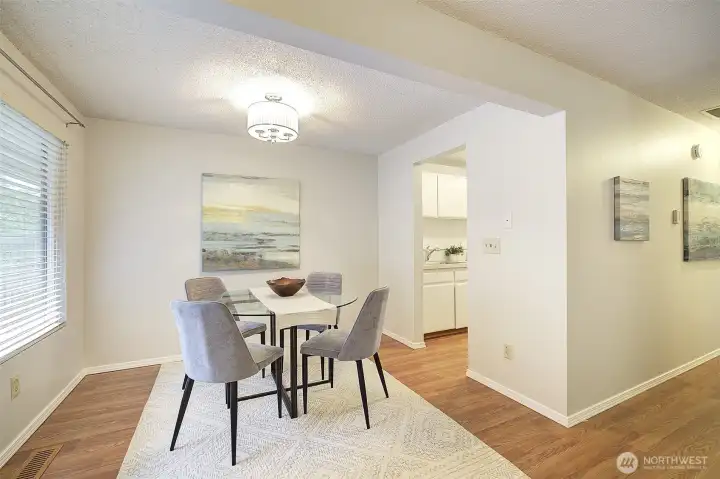 You can see that this home is thoughtfully designed with open living areas and a circular flow through the kitchen.  It seems larger than its 690 square feet, don't you agree?