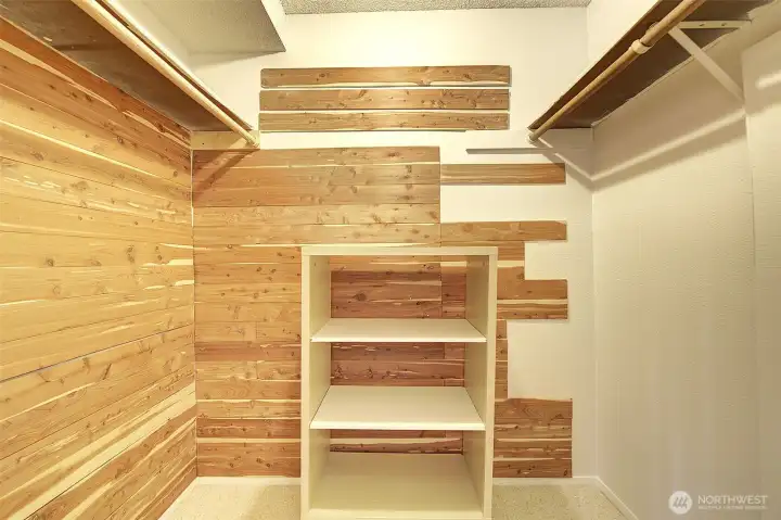 This huge partially cedar-lined walk-in closet is in the bedroom.  Imagine your clothing for all seasons fitting easily in here.
