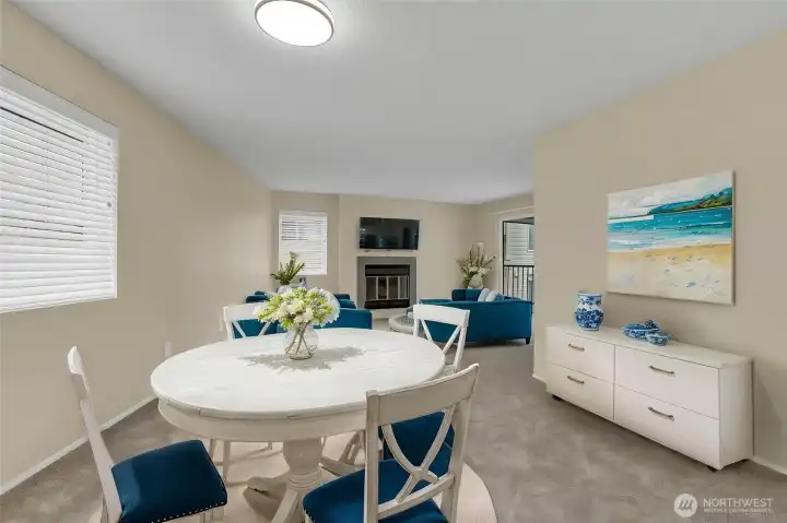 Virtually staged Dining Area that flows into Living Room