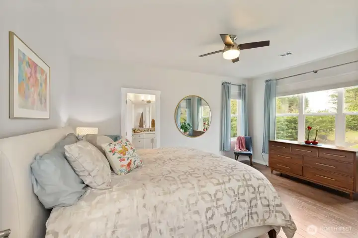 The gorgeous primary suite enjoys complete privacy and fabulous views.