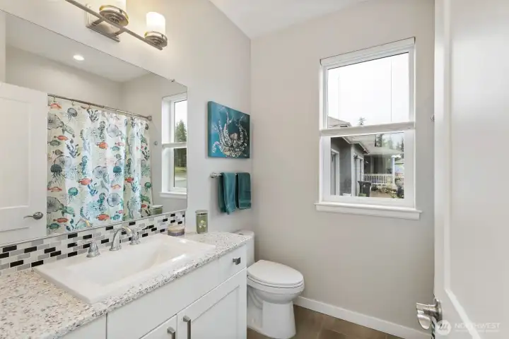 The fabulous full bath is perfect for guests!