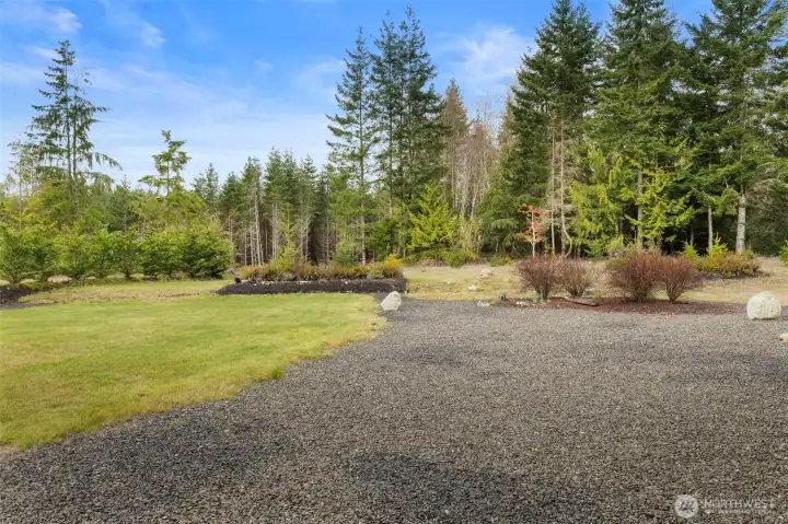 Private and peaceful, this level .45 acre lot stretches to the tree line.