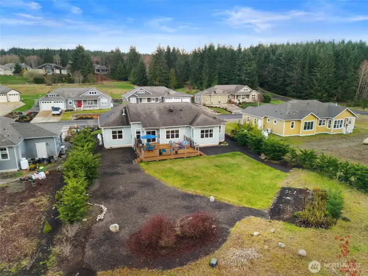 From above, this beautiful setting is on display! So many options including gardening and recreation can be yours!