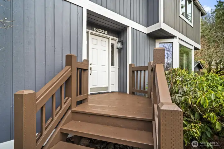 Front porch invites guests inside.