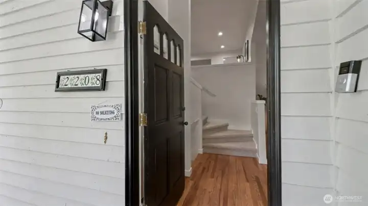 Refinished hardwood floors greet you as your enter