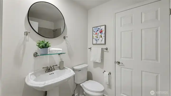 The two secondary bedrooms are served by this full hall bath. Door leads to washer/dryer room.