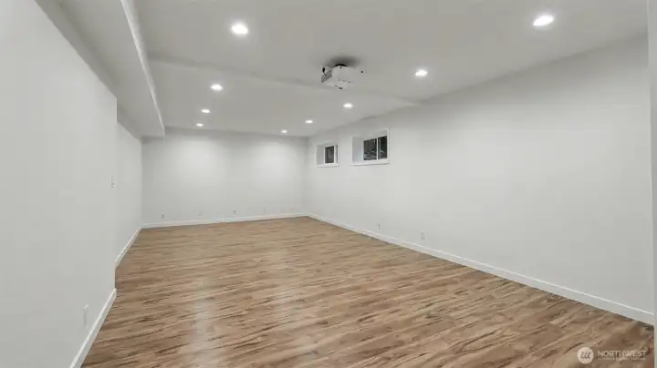 Downstairs rec room/media room is pre-wired for surround sound and projector.