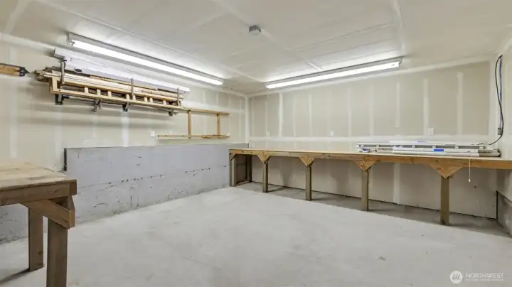 Approximately 300 sq ft shop located through the garage