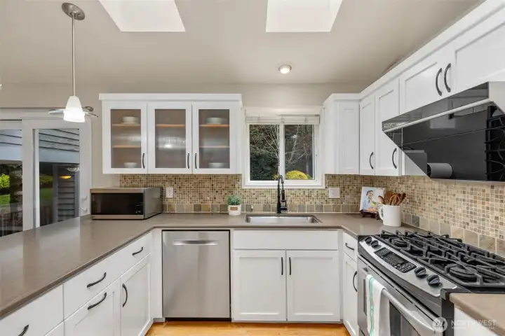 Stainless steel appliances and updated cabinets.