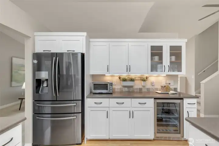 Excellent use of space in this open kitchen with beverage fridge too!