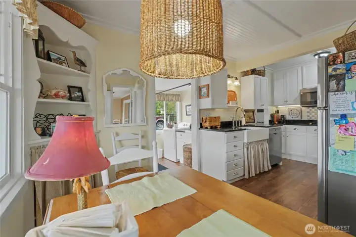 Dining area looking towards kitchen and laundry room