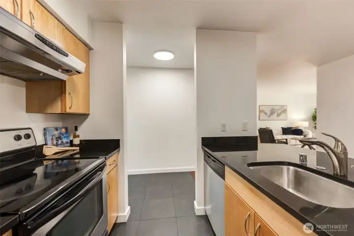 View of the kitchen looking towards living room.