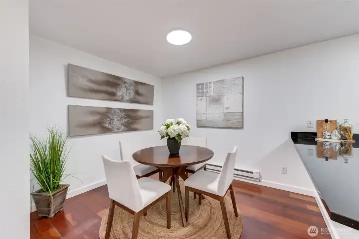 View of generous sized dining room. A larger table could fit here.