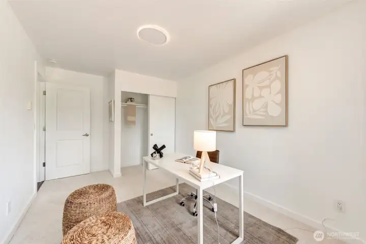 First bedroom could be an office/den or guest room. New carpet.